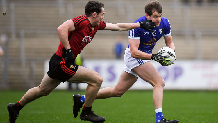 Simon Cadden, Cavan, and Rory Mason, Down in Dr McKenna Cup action at Kingspan Breffni.