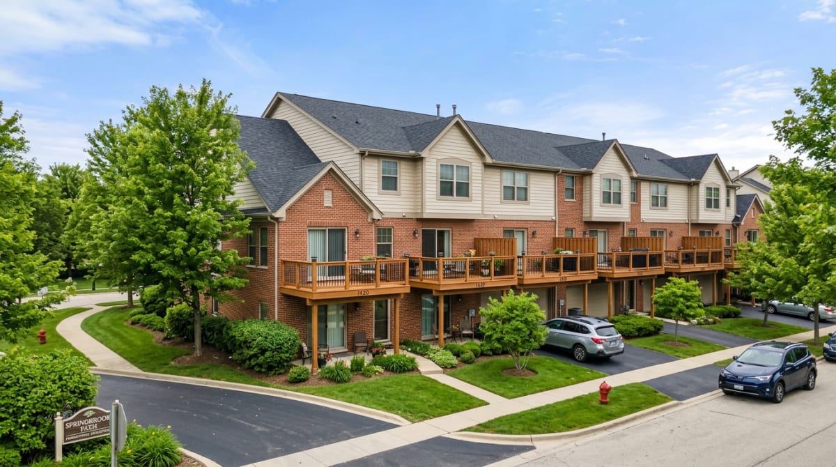 Chicago-area townhome community with matching HOA-approved deck designs on multiple units