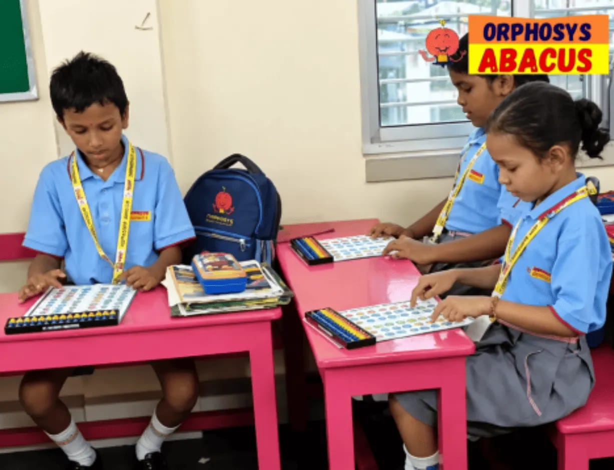 Child Practising Abacus at Home | Orphosys Foundation Child practising abacus at home with a parent beside her