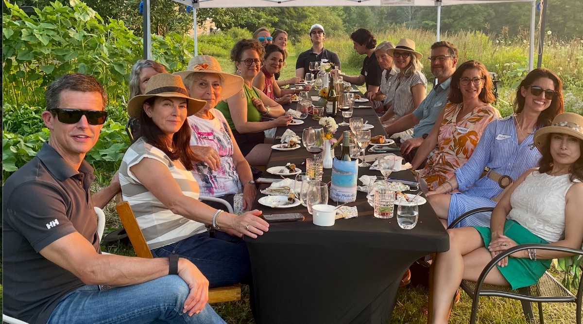 Farm Table Dinner July 24: a shared meal and ritual of connection.