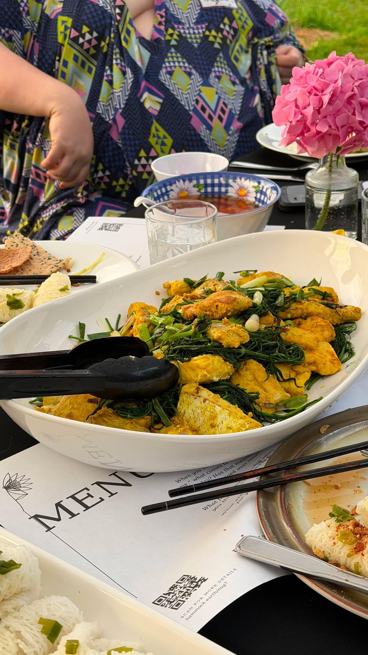 A dish being served at the table