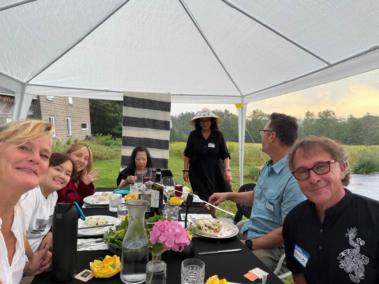 Guests gathered around the table for a group photo