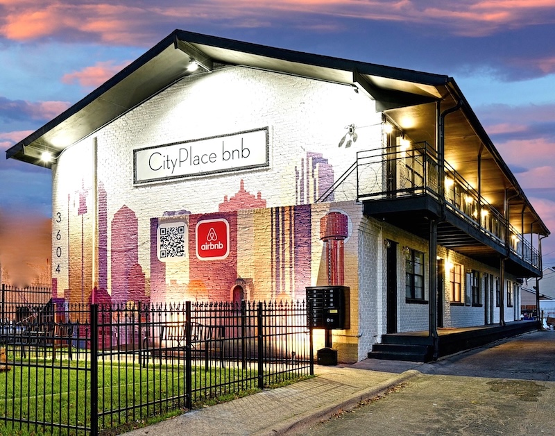 CityPlace BnB building exterior with Dallas skyline mural