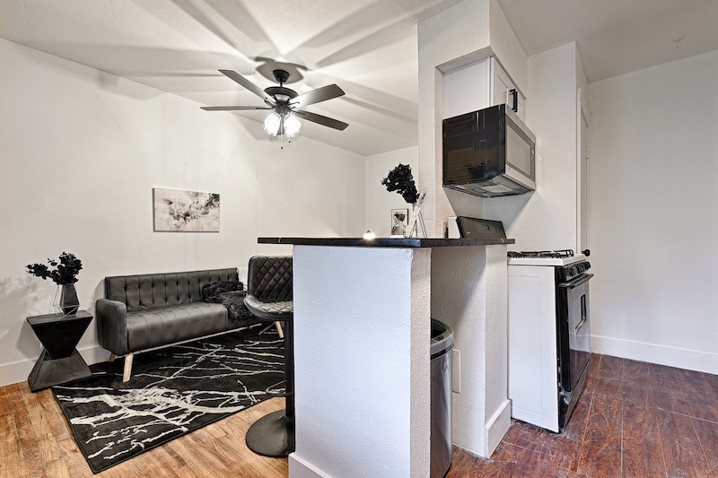 Modern kitchen with stainless steel appliances and granite counters