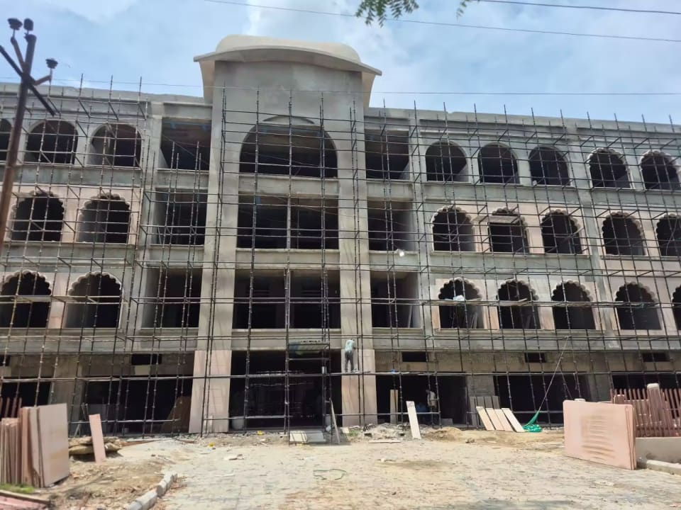 Front elevation showing arched openings at Krishna Bhumi Arcade