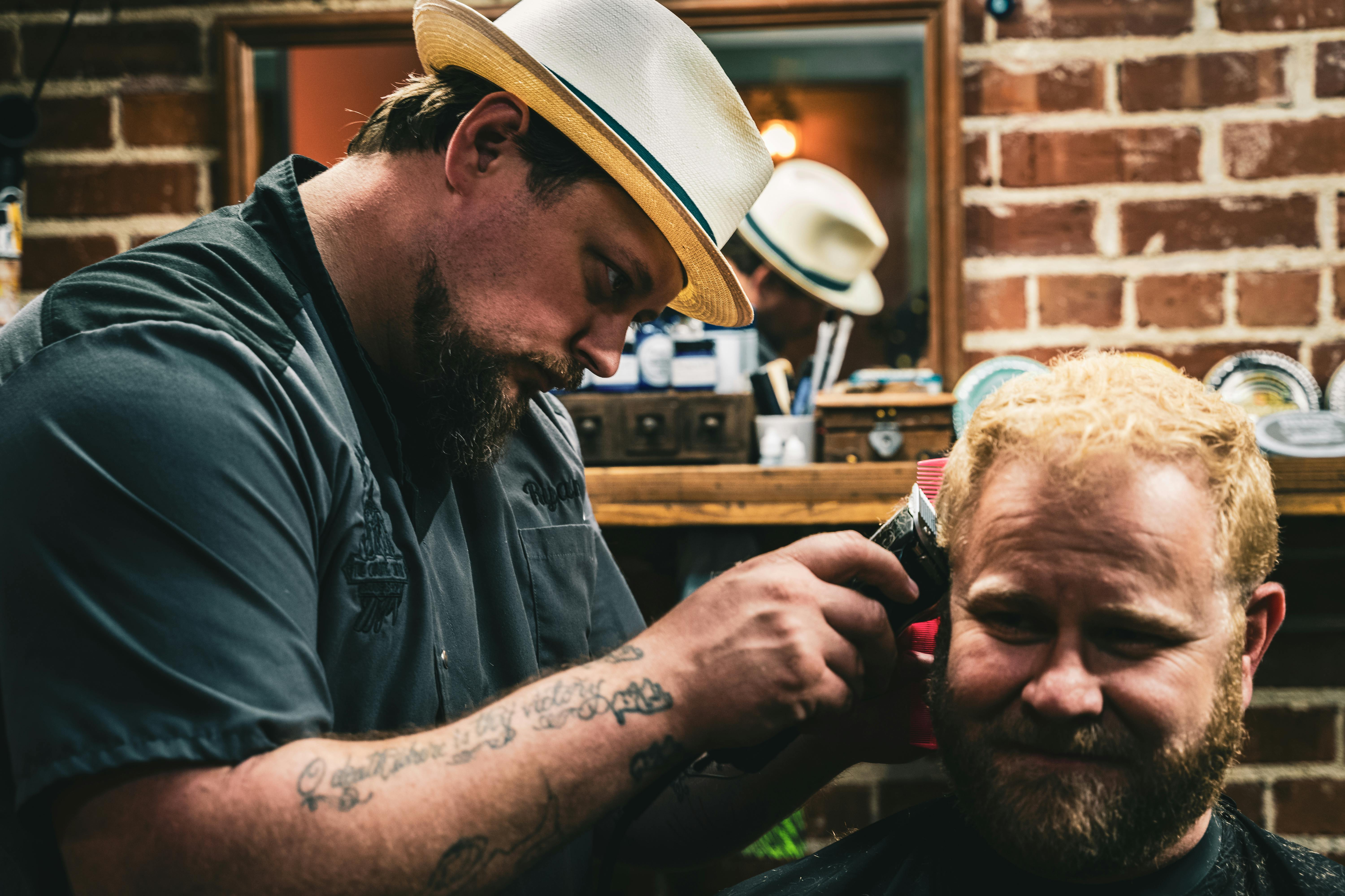 Photo of man having a haircut