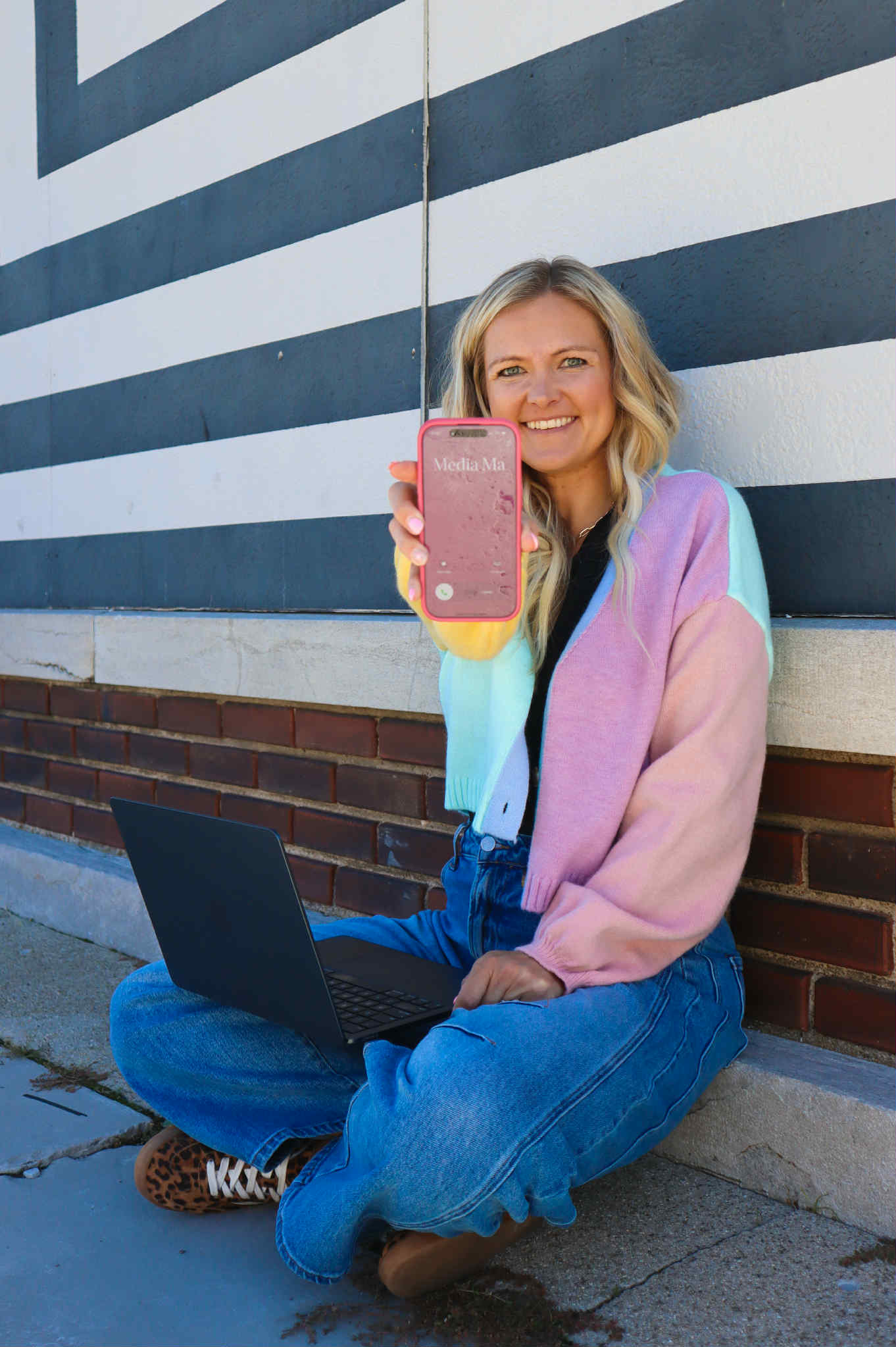 Holly holding phone