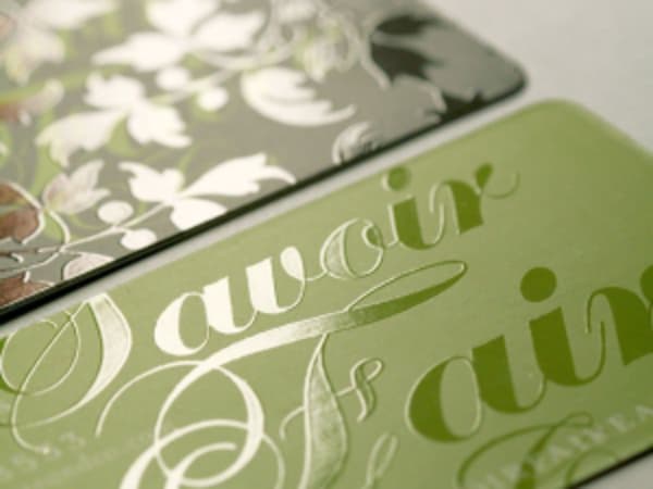 Spot UV gloss coating applied to specific areas of packaging box finishing on box