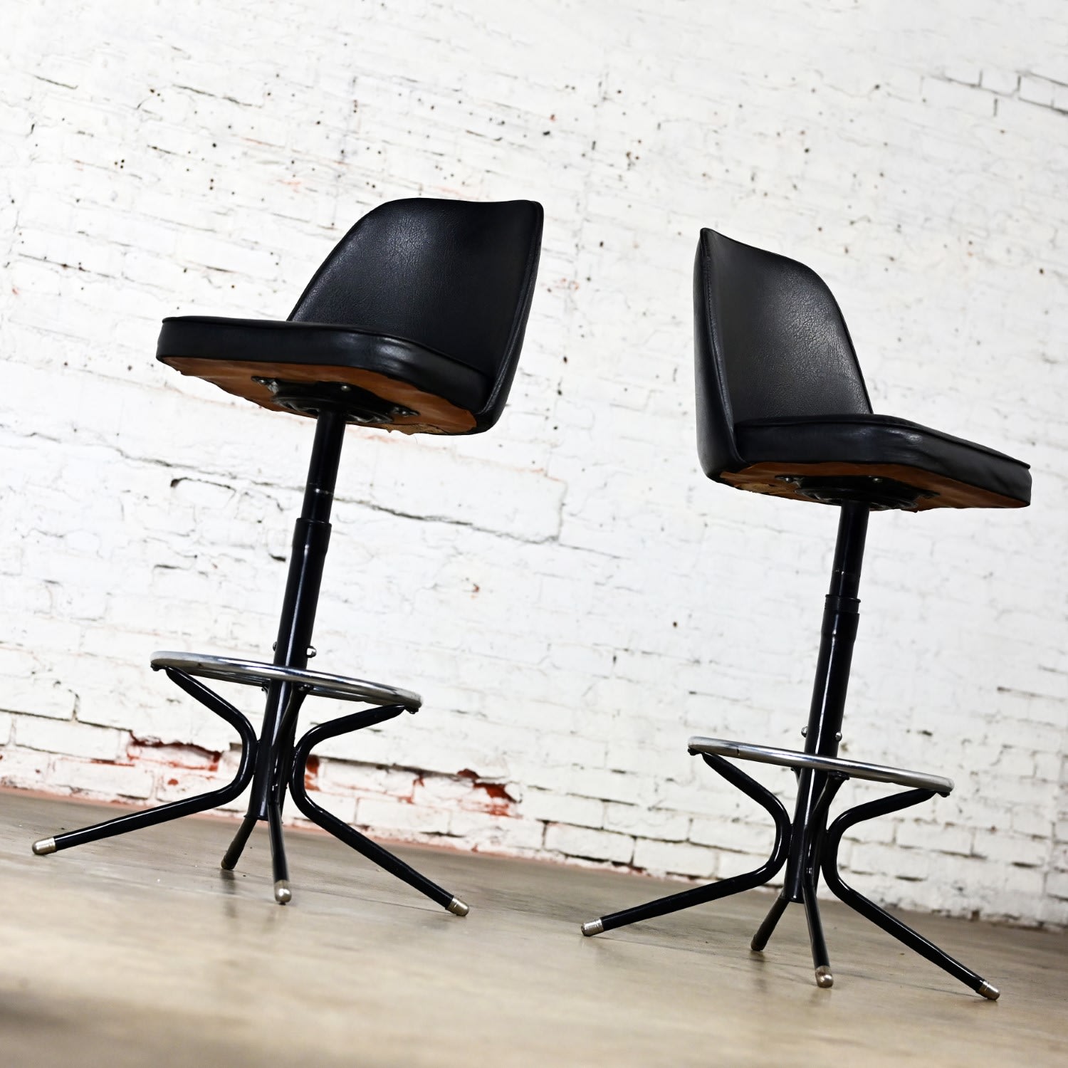 Mid-20th Century MCM Adjustable Swivel Barstools Black Vinyl Chrome & Black Painted Steel a Pair