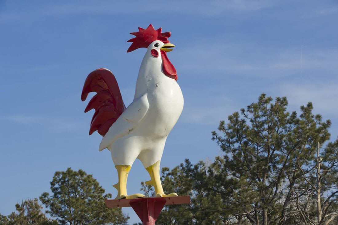 Lee's Chicken Sign and Pioneer Pete