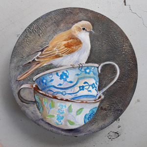bird and tea cups