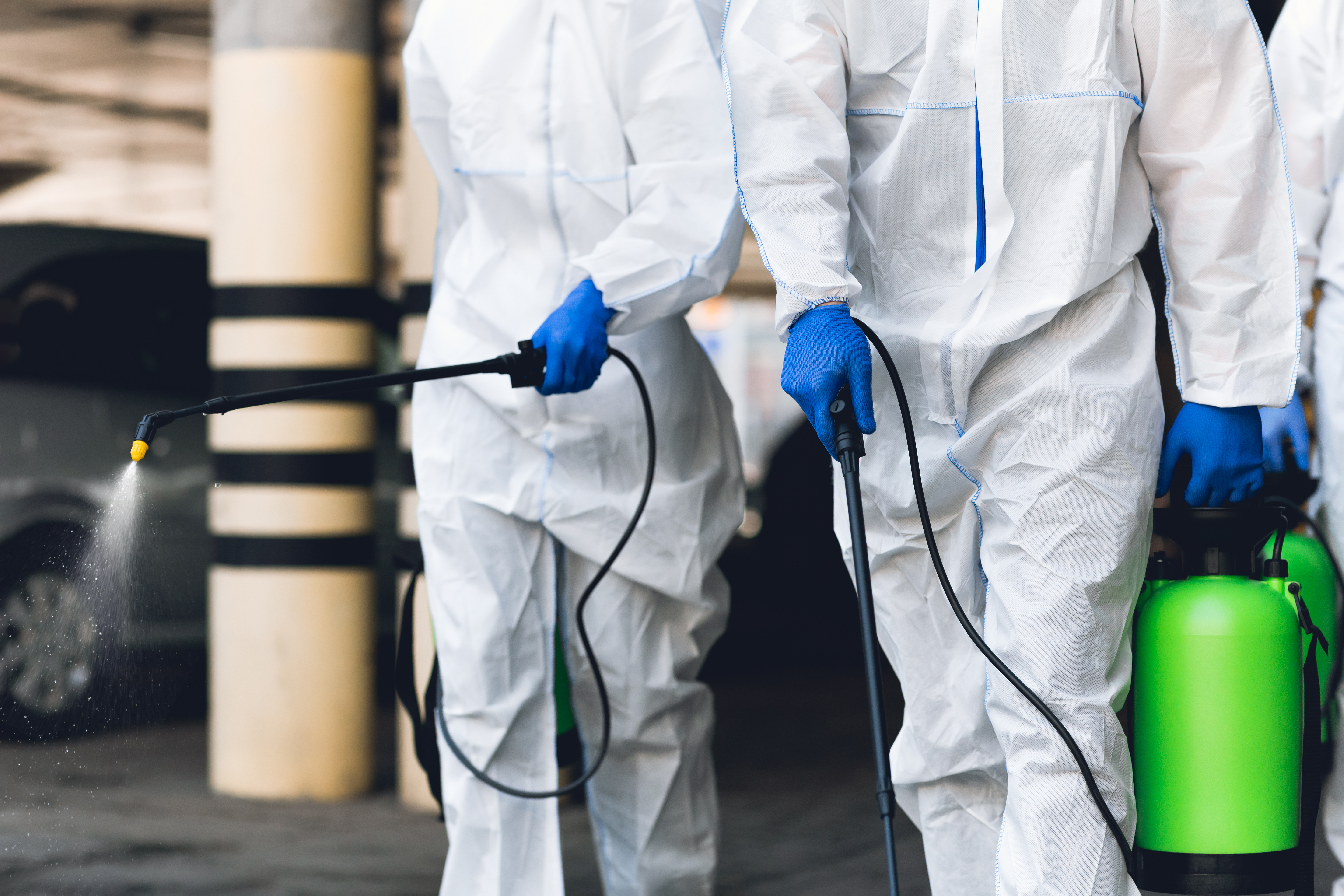 Environmental contractor in protective equipment performing remediation work covered by contractors pollution liability insurance