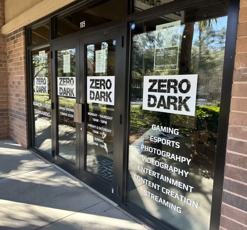Zero Dark gaming lounge interior in Bluffton SC with PC stations and neon lighting