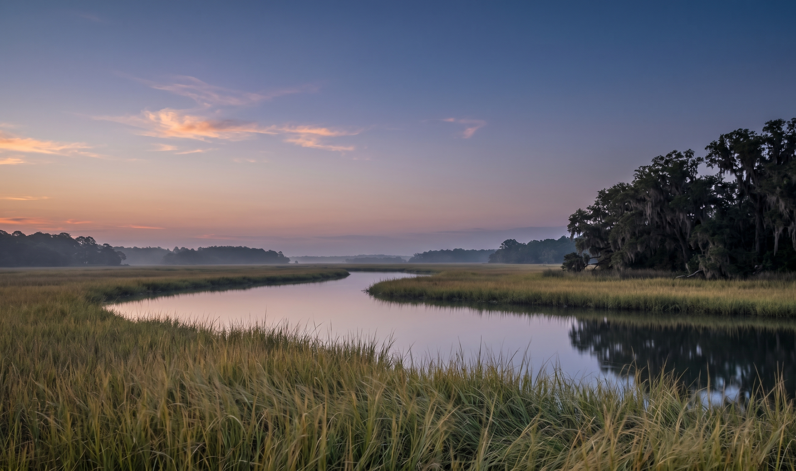 Lowcountry marsh at sunset with cloud reflections