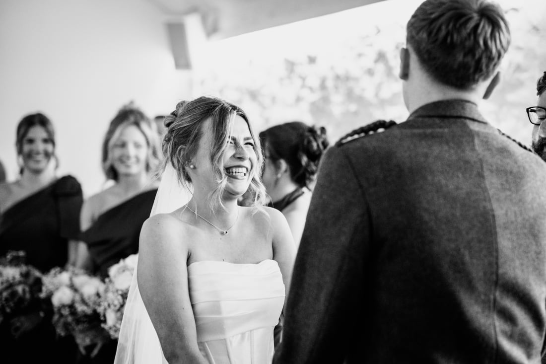 Ellie laughs as she reaches the front of the barn