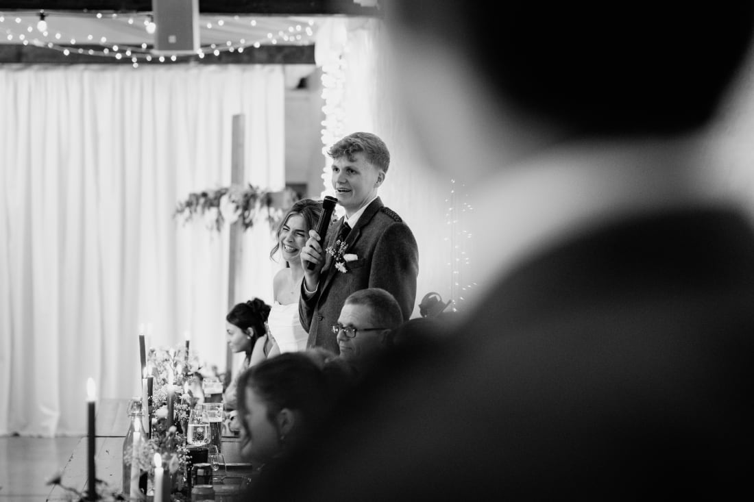 A speech at the top table in the barn
