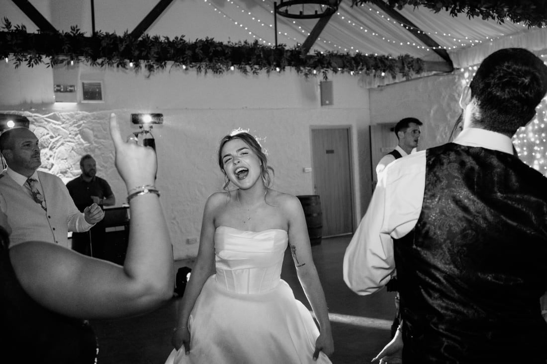 Ellie sings along on the busy dance floor