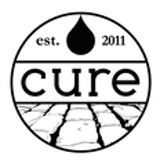 Cure Coffeehouse and Brasserie Logo