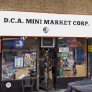 D.C.A Mini Market Logo