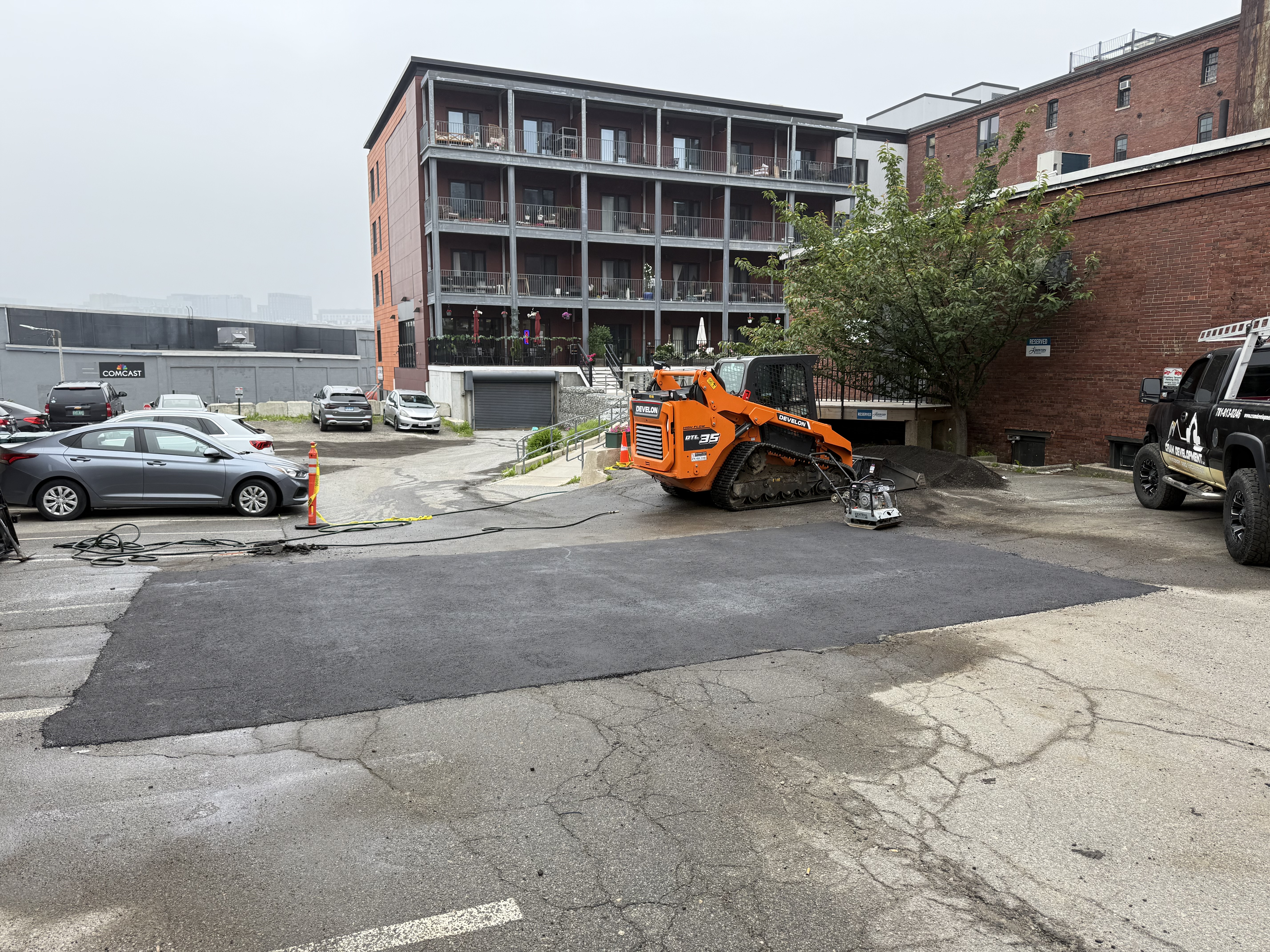New asphalt paving and concrete curbs at The Distillery North