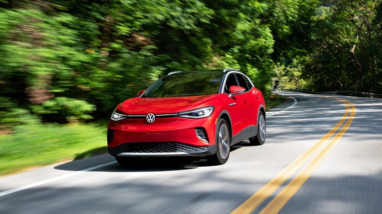 A red 2021 VW ID.4 AWD Pro S with the Gradient Package on the highway