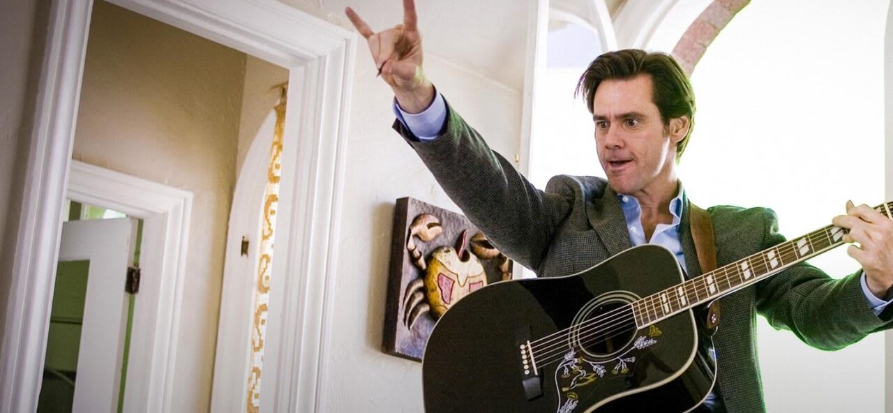 Jim Carrey nei panni di Carl Allen
