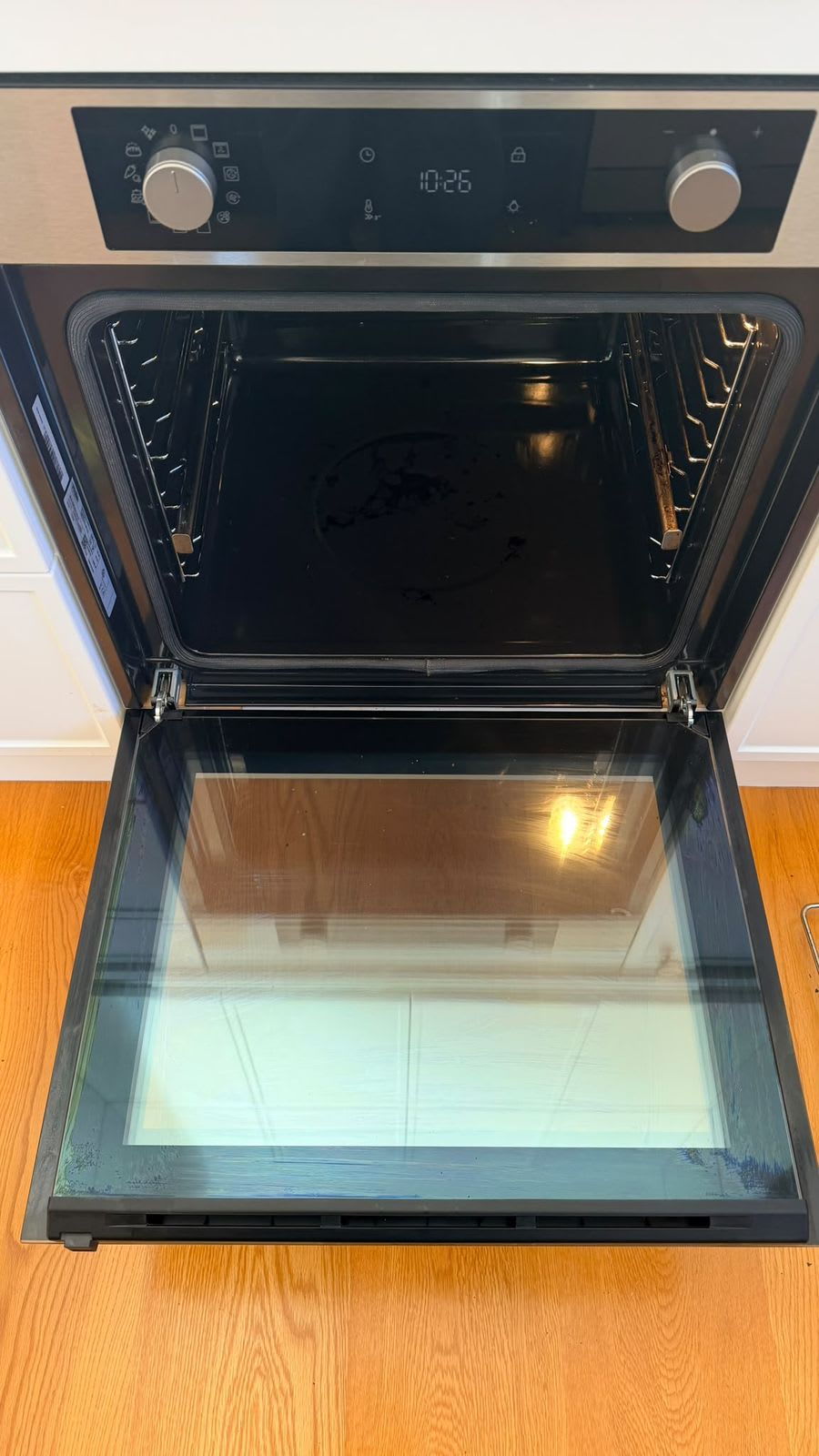 Oven with door open, glass degreased