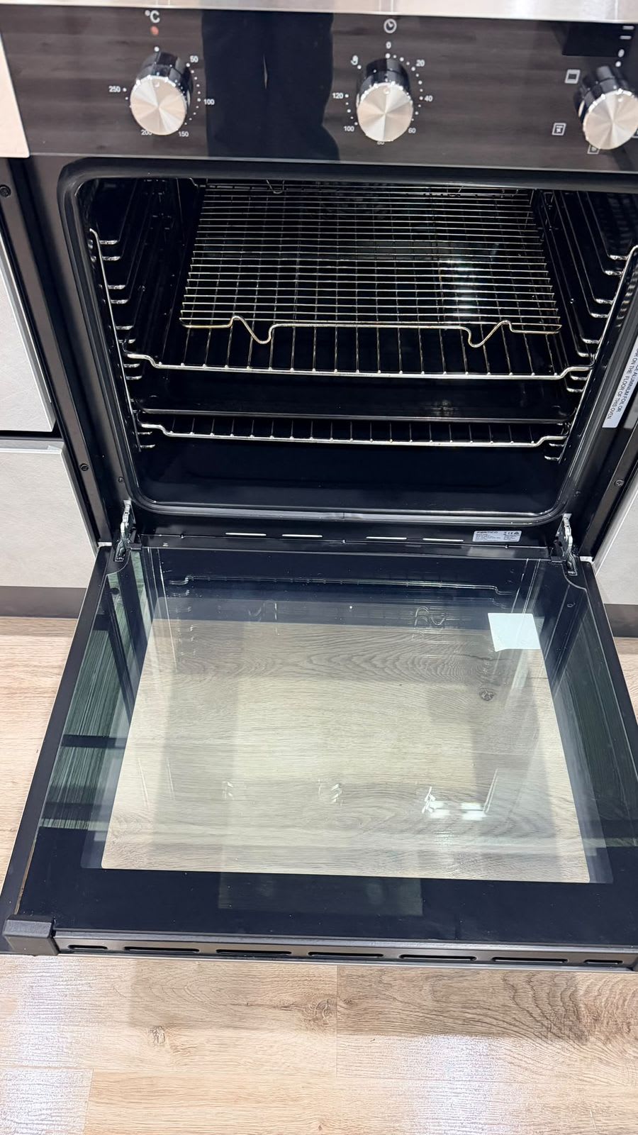 Oven racks and door glass cleaned