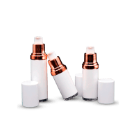 white-airless-bottle-w-gold-rim