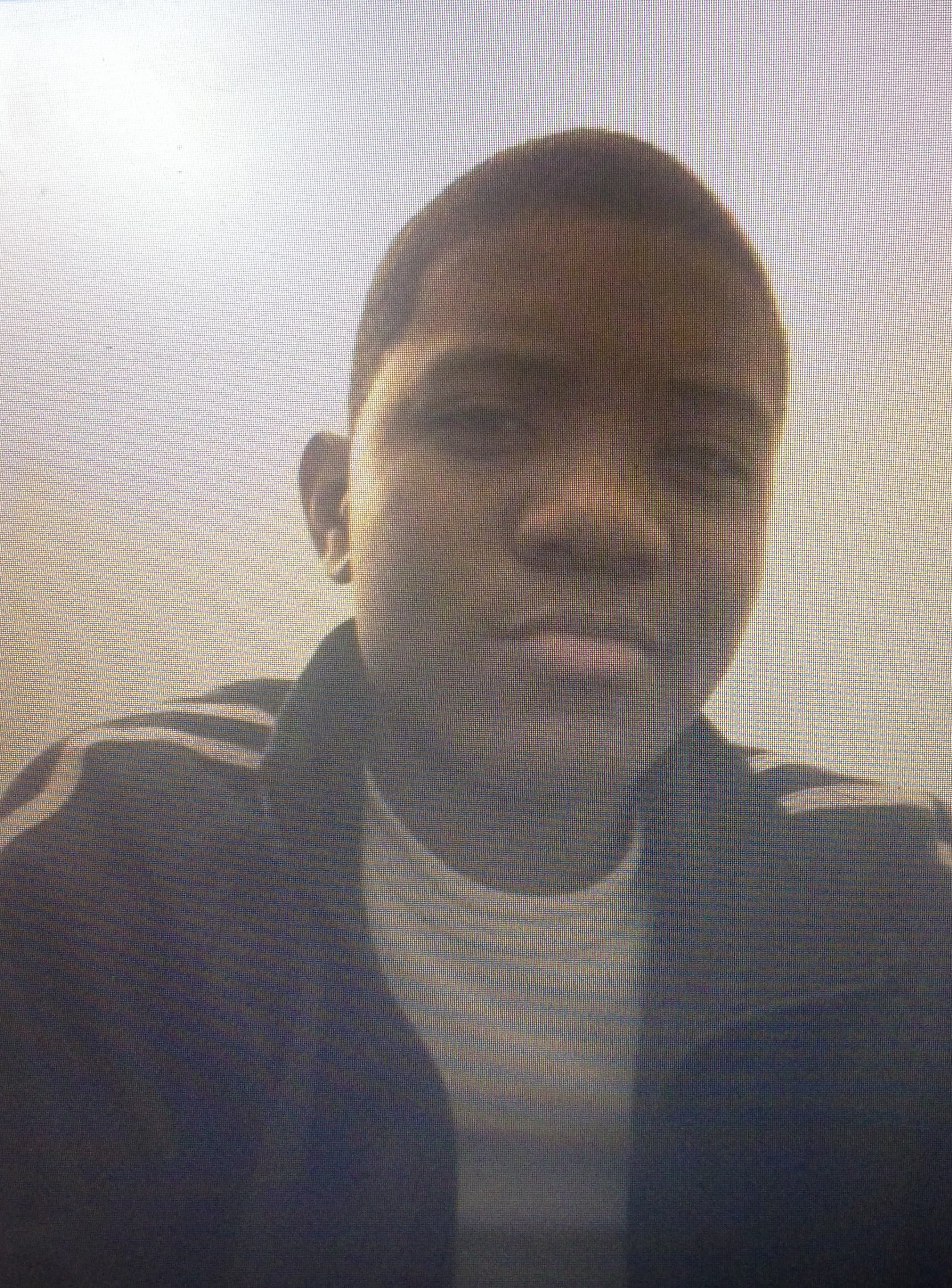 Teenage throwback: grainy selfie of a young Kama in an adidas track jacket