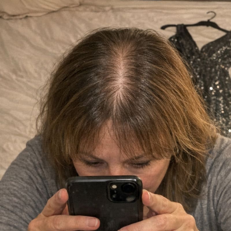 Day-two hair, the part looks wider
