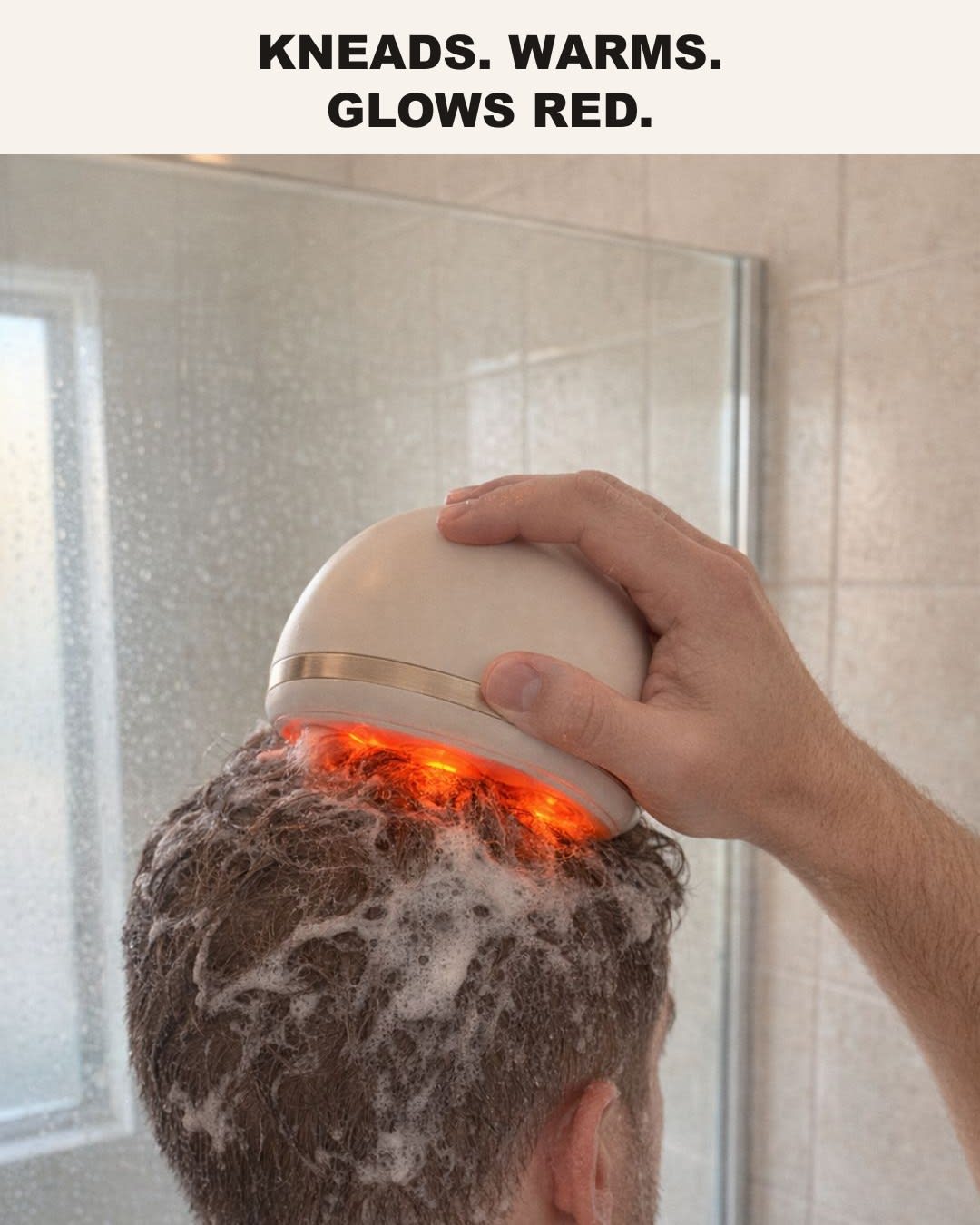 The dome at his crown, red light through the lather