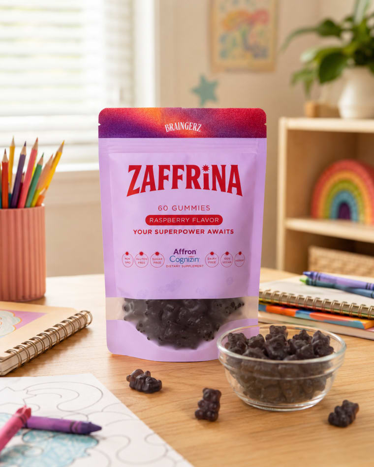 A child's desk with crayons and the gummies