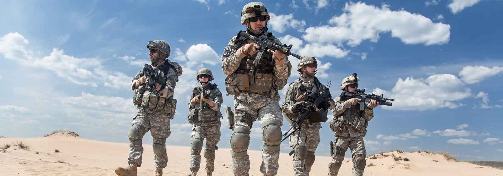 United States paratroopers airborne infantrymen in action in the desert