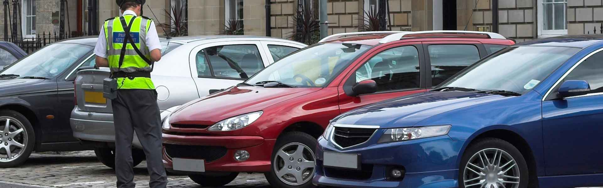 parking attendant, traffic warden, getting parking ticket, parking ticket fine mandate