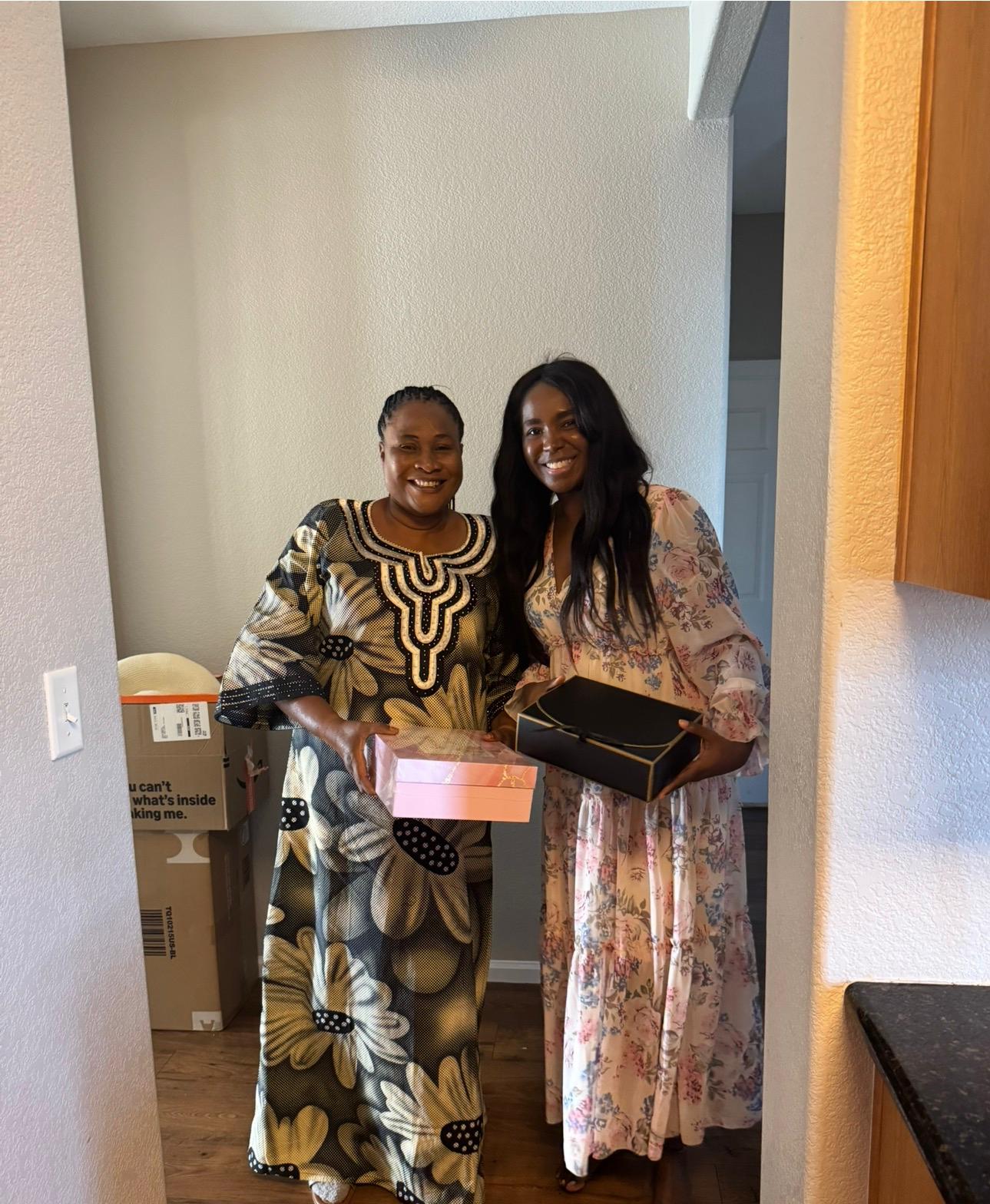 You in Bloom delivery team bringing Bloom Box to community members with smiles and encouragement