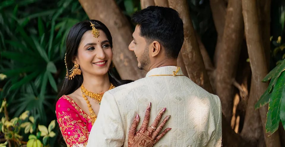 Smiling couple during romantic engagement shoot in Hubli
