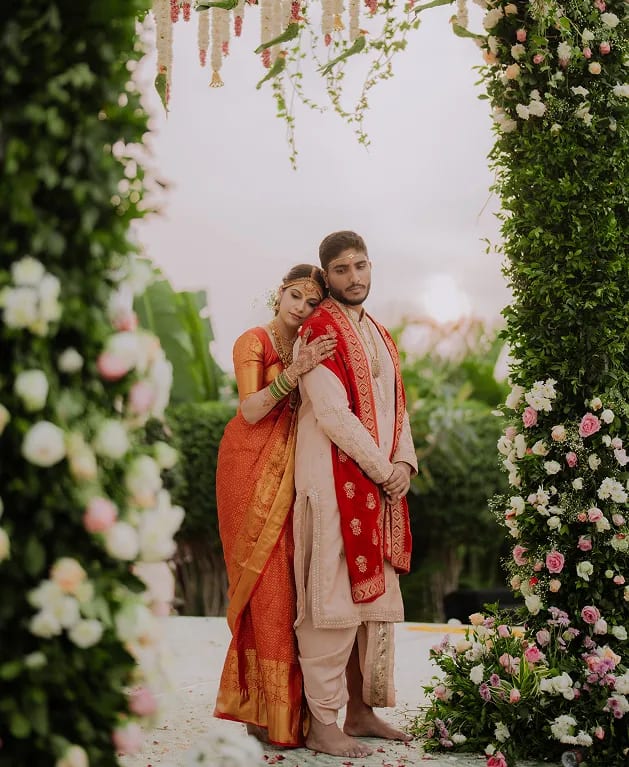 Candid bridal preparation moment with soft natural lighting