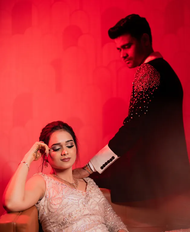 Glamorous cocktail party portrait with red lighting