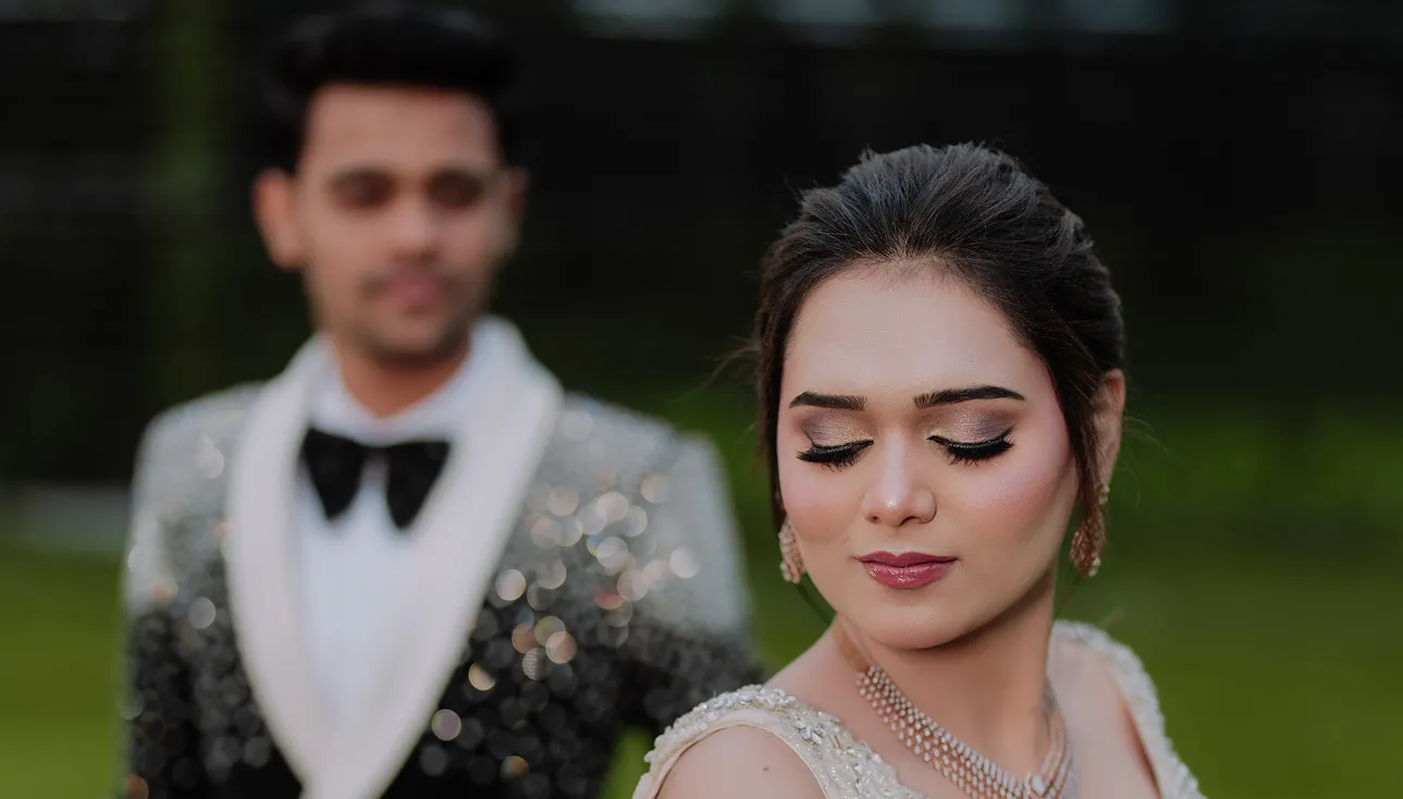 Elegant couple portrait during evening wedding reception