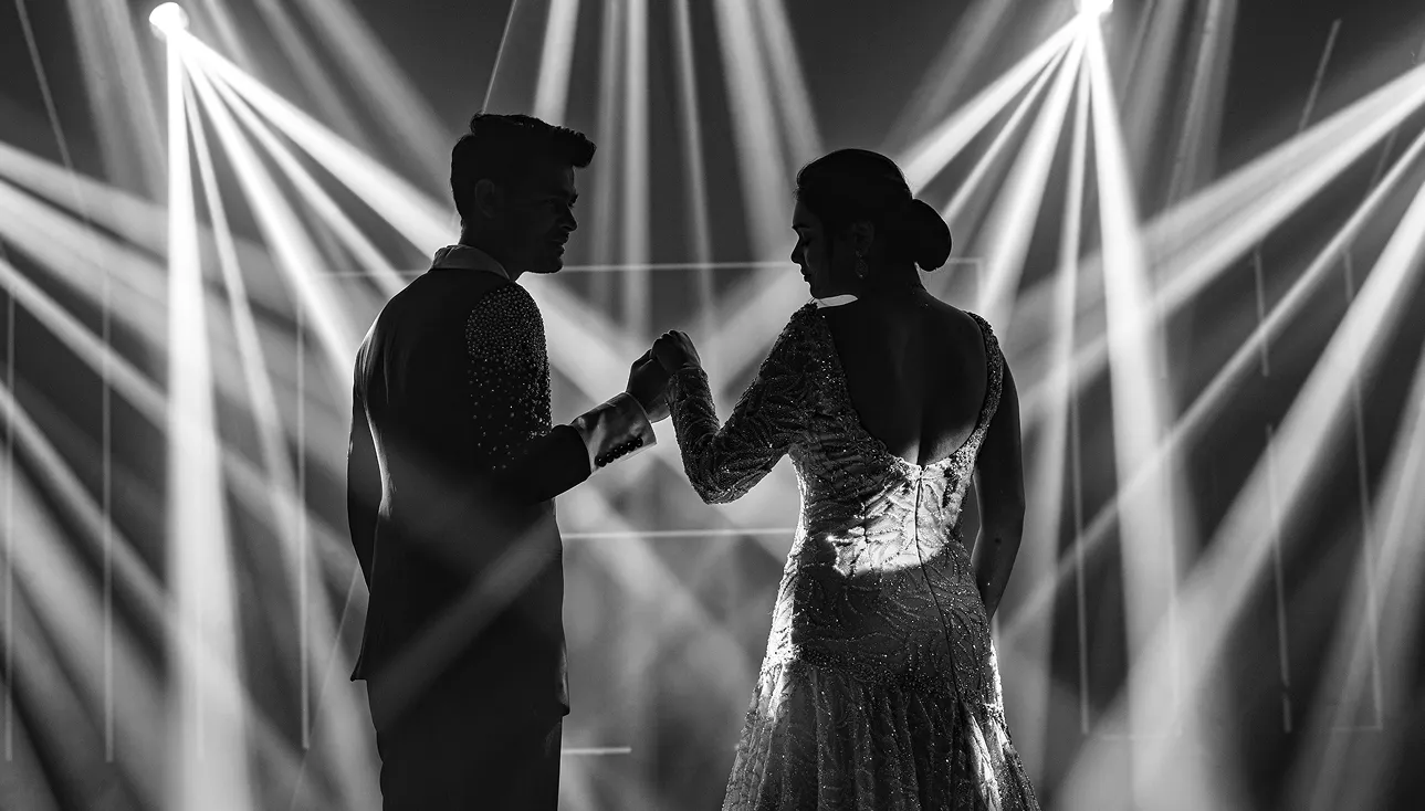 Dramatic black and white silhouette portrait during cocktail party