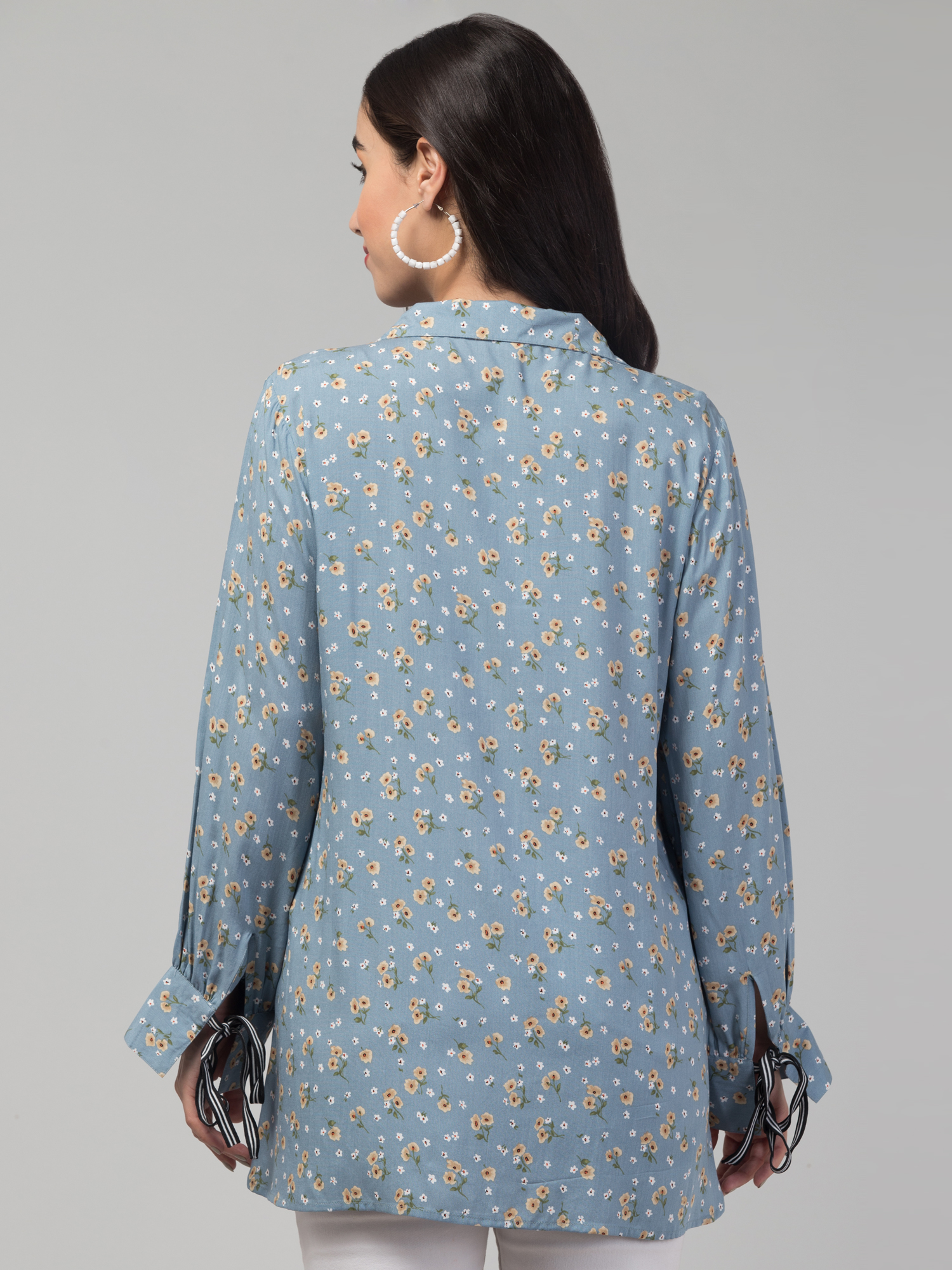 floral print top with striped ribbon tie