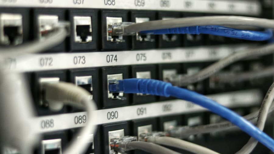 Network cables connected to infrastructure equipment