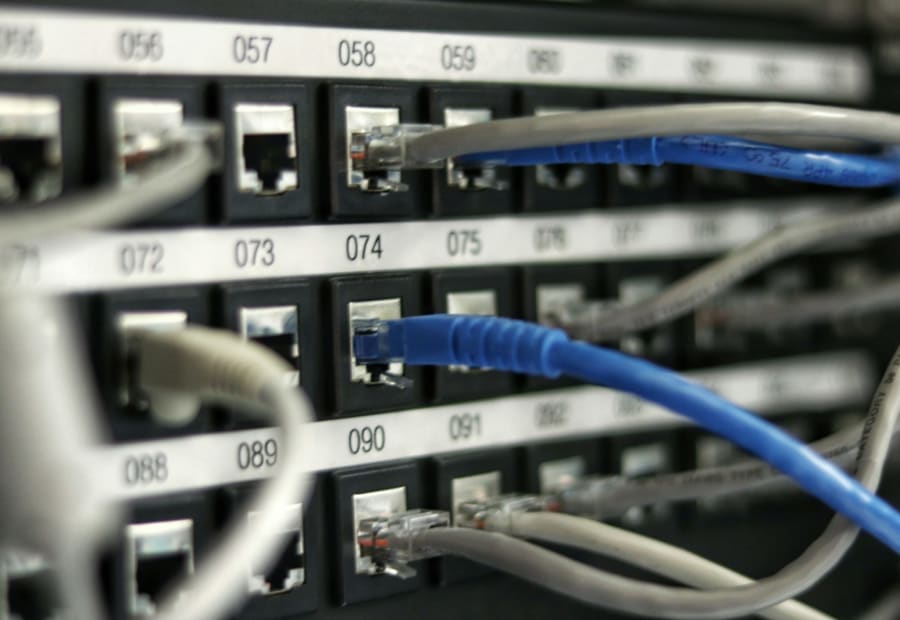 Network patch panel with coloured cables
