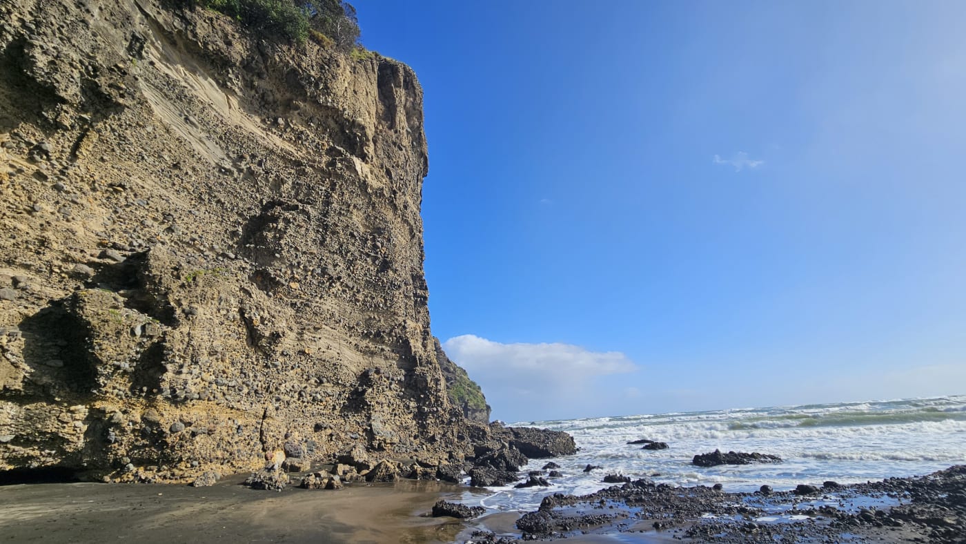 Black sand and cliffs at Piha Beach, New Zealand