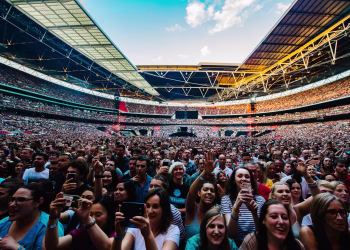 Fans en el concierto del estadio de Wembley