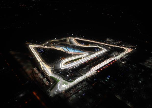 The Bahrain International Circuit illuminated at night by the floodlights