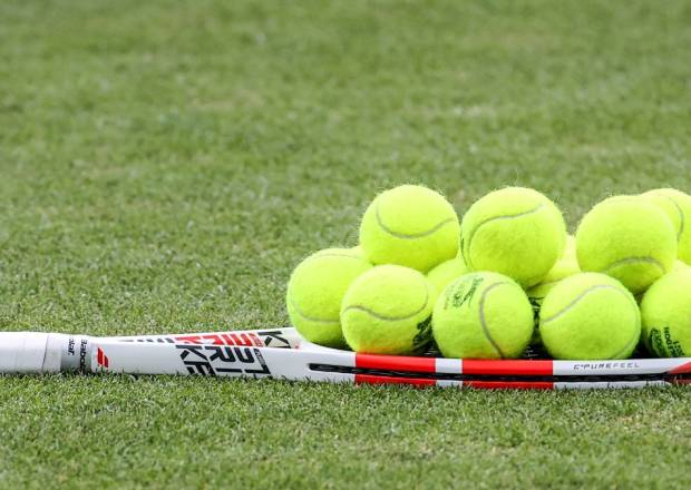 Balls on racket at All England Lawn Tennis Club