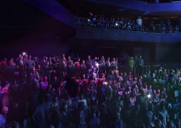 Fans watching concert from premium seating level