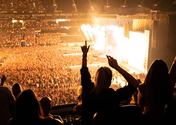 Fans enjoying a busy concert 